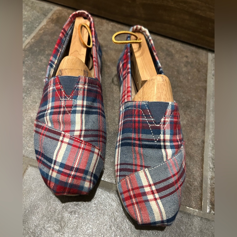 Women’s TOMS red, blue, and white plaid canvas slip ons